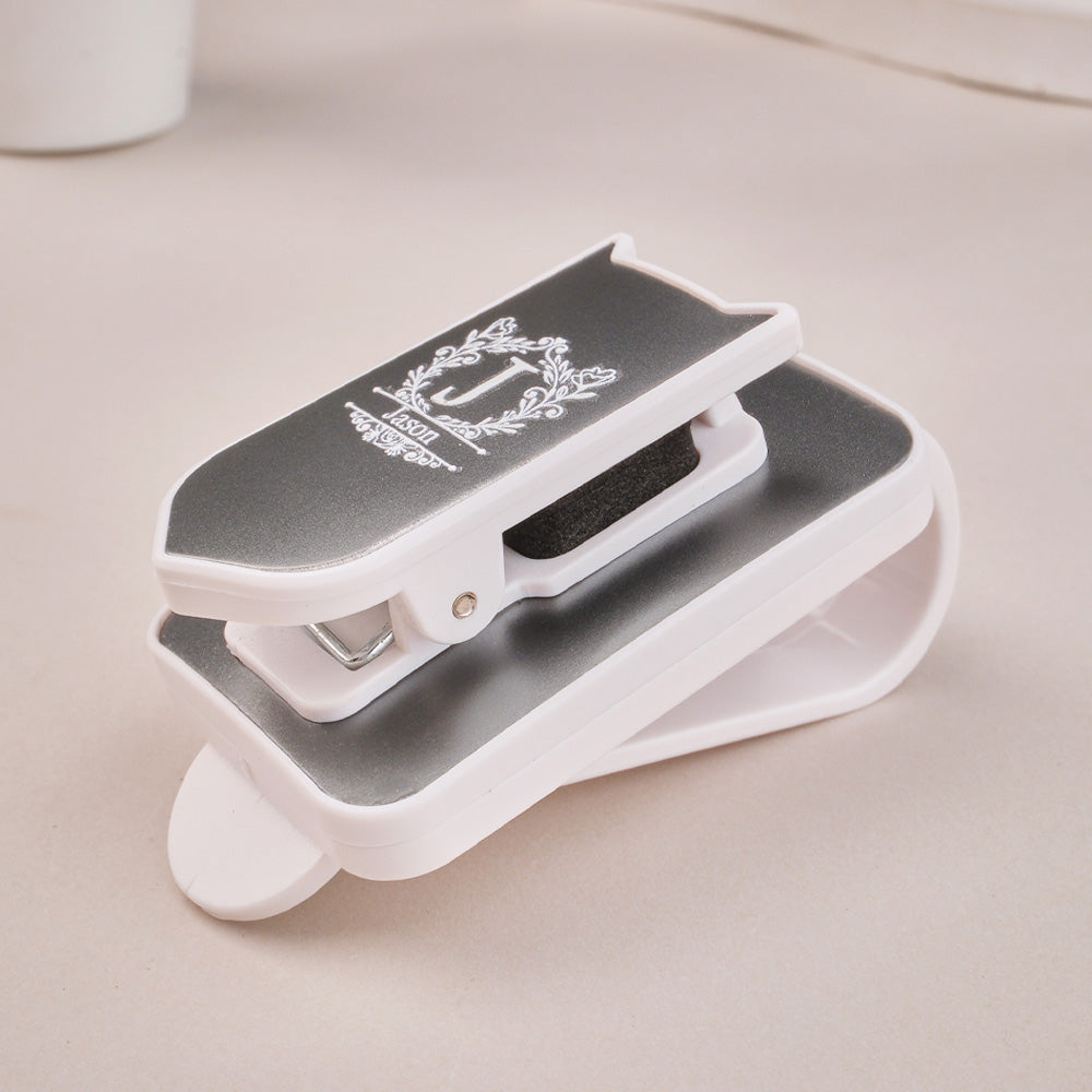 High-quality ABS plastic sunglasses holder on a car sun visor with dimensions 1.5 in × 2.68 in (3.8 cm × 6.8 cm).