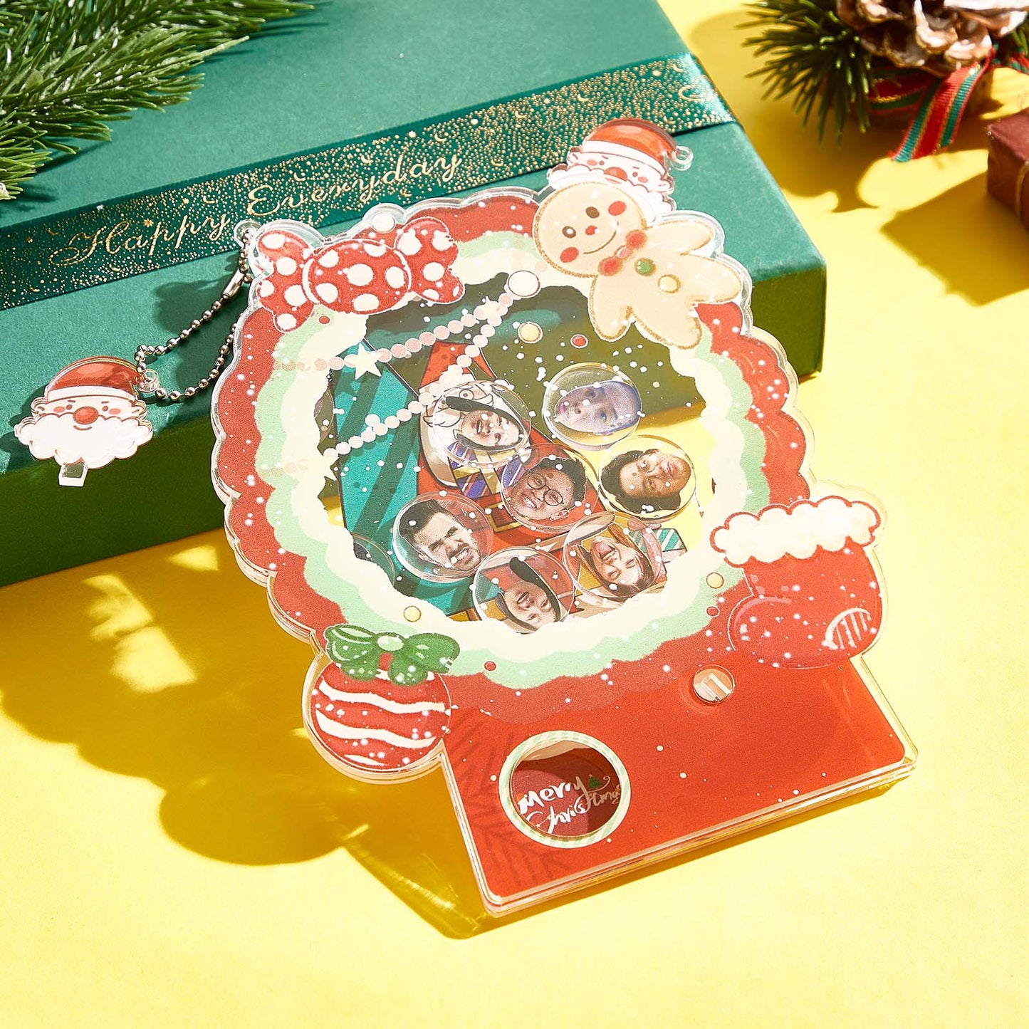Close-up of personalised gashapon capsule with photo inside — clear acrylic Christmas keepsake and playful shake toy for children
