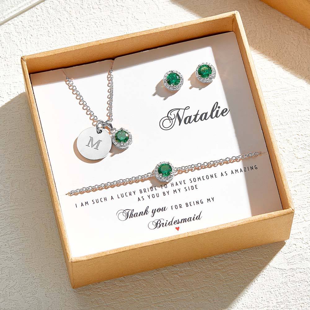 Flat-lay of personalised bridesmaid jewellery set showing 45cm necklace, matching bracelet and earrings — perfect bridesmaid gift