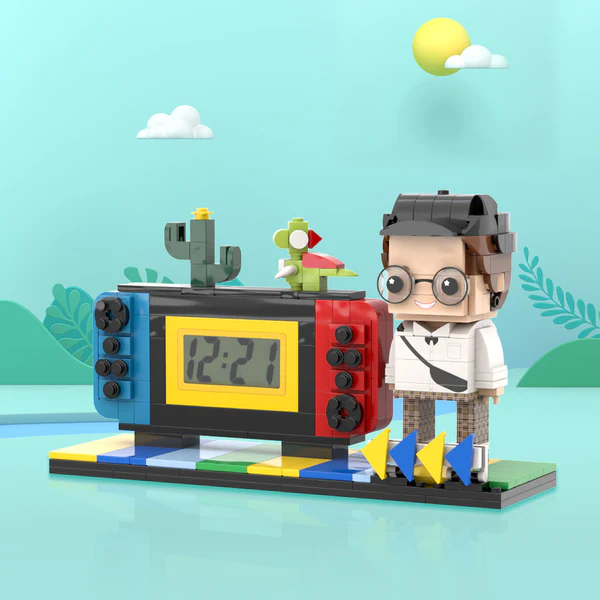 Close-up of a customised brick figure with personalised hairstyle and facial expression on a handheld game console style clock — custom brick figure clock gift for gamers