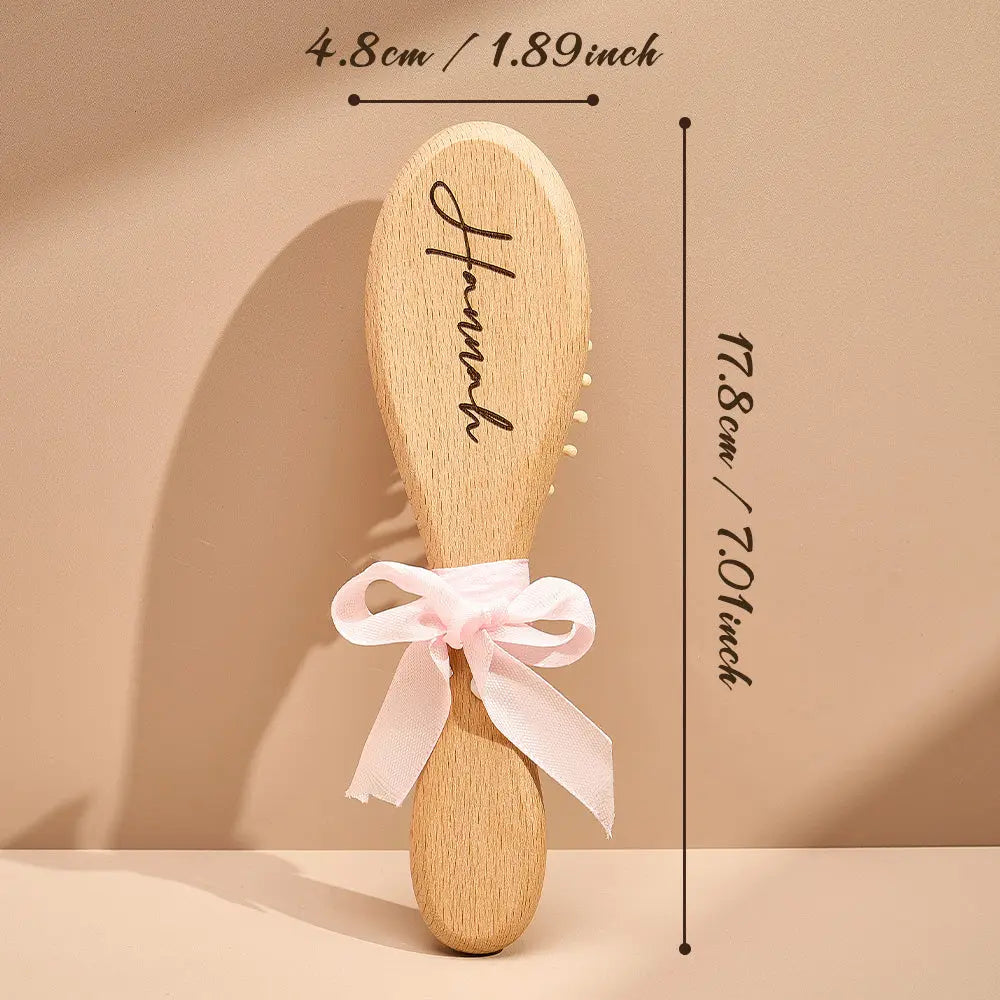 Smooth natural wood grain and finish on personalised brush and comb — high-quality wooden baby care set designed for newborns