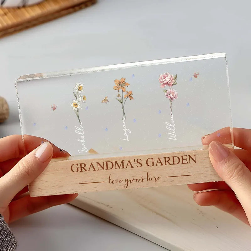 Comparison of unlit and lit personalised birth flower night light showing engraving clarity and soft LED glow
