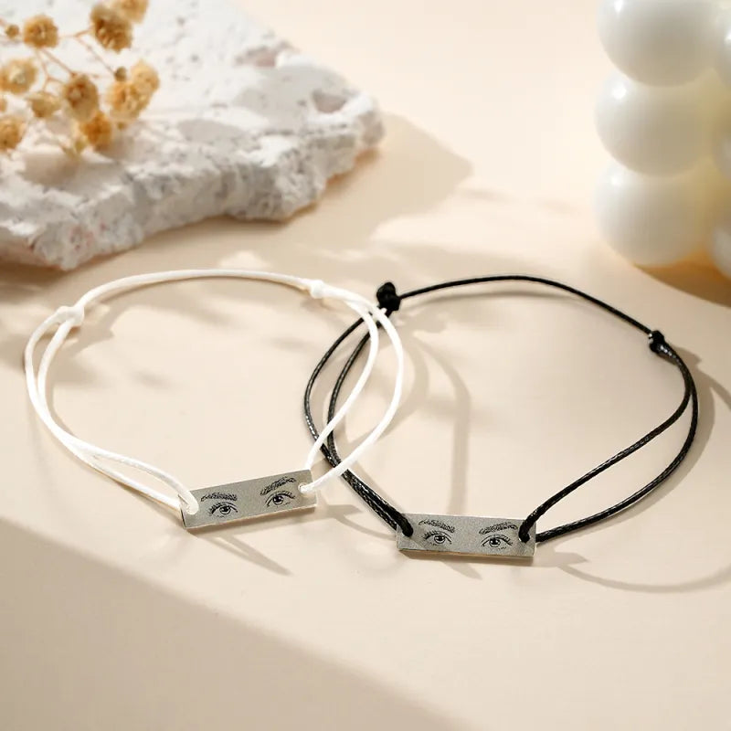 Detailed macro of the engraved iris showing high-resolution micro-engraving on personalised eyes photo bracelet charm