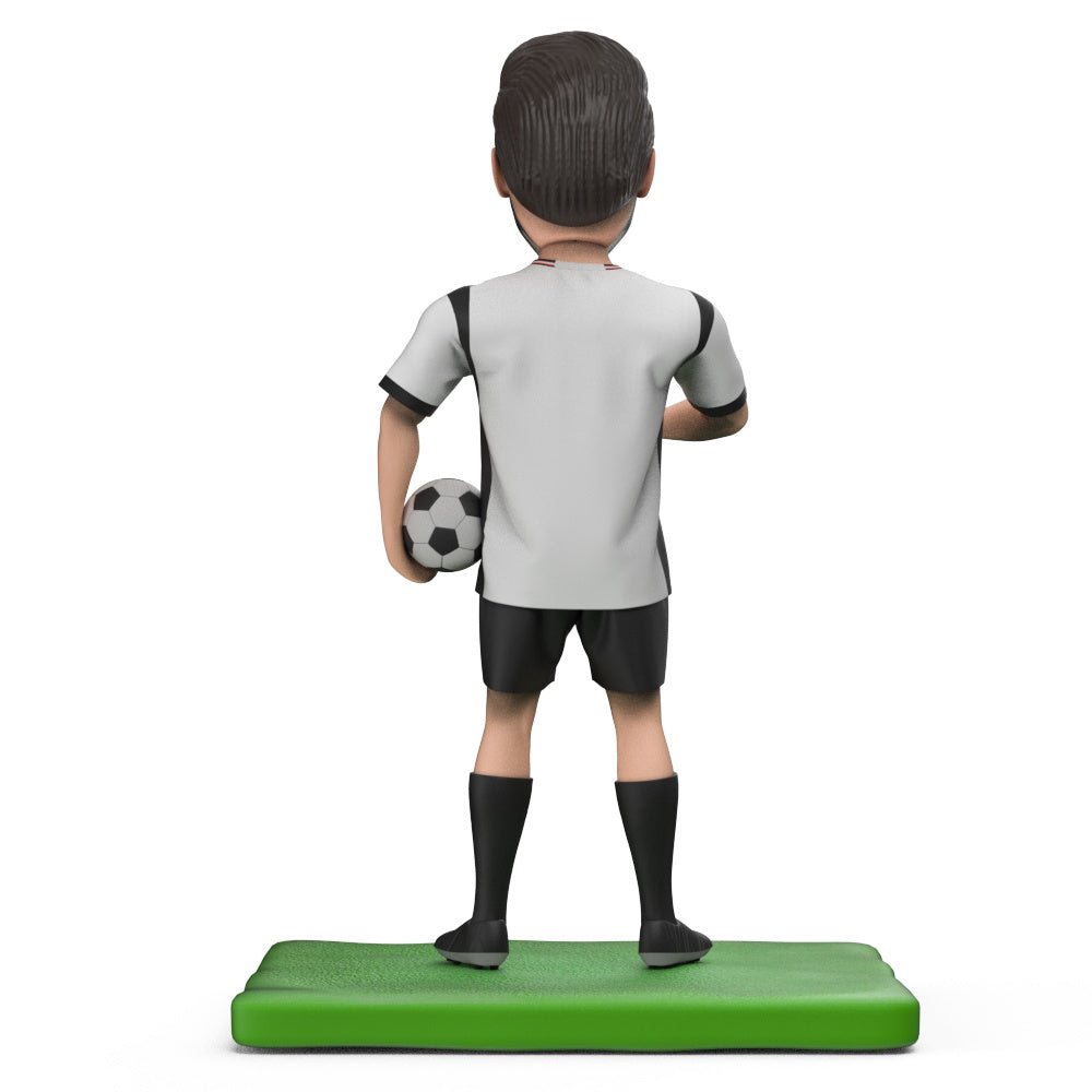 Side view of personalised Germany 2022 World Cup football bobblehead highlighting team kit, pose and custom photo-based head