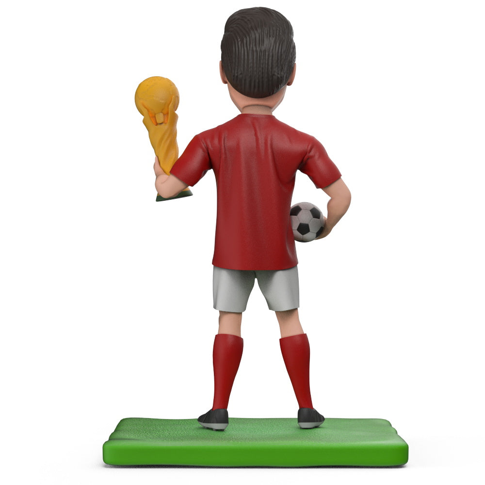 Side angle of personalised World Cup champion bobblehead showing hand‑sculpted polymer clay detail and engraved text — ideal football fan gift