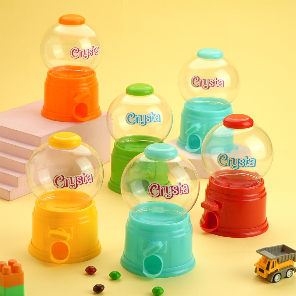 Personalised gashapon candy dispensers used as table decorations and party gifts - great for themed children’s birthday celebrations