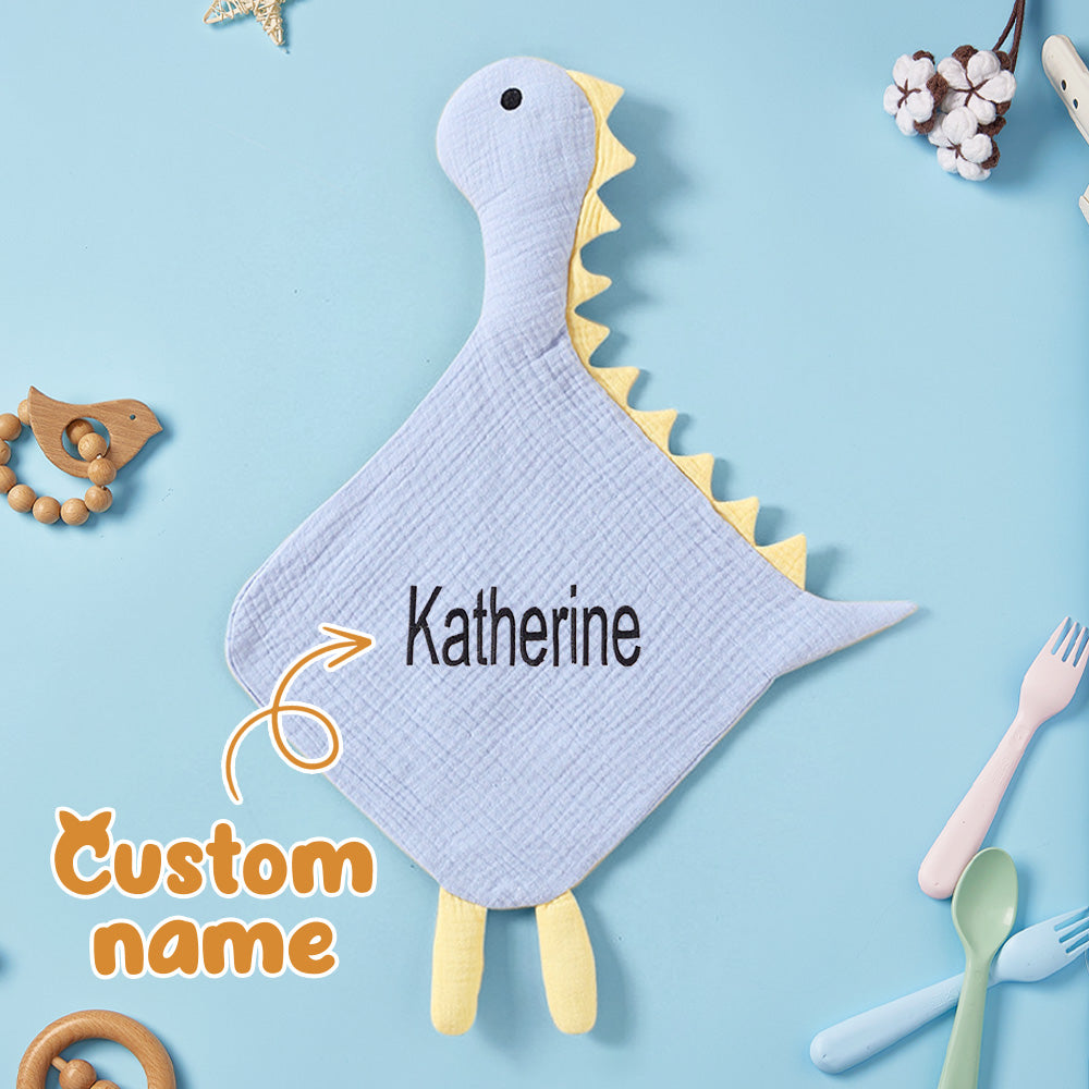 Close-up of embroidered swan and customised name on baby comforter — embroidered baby comforter detail and quality stitching