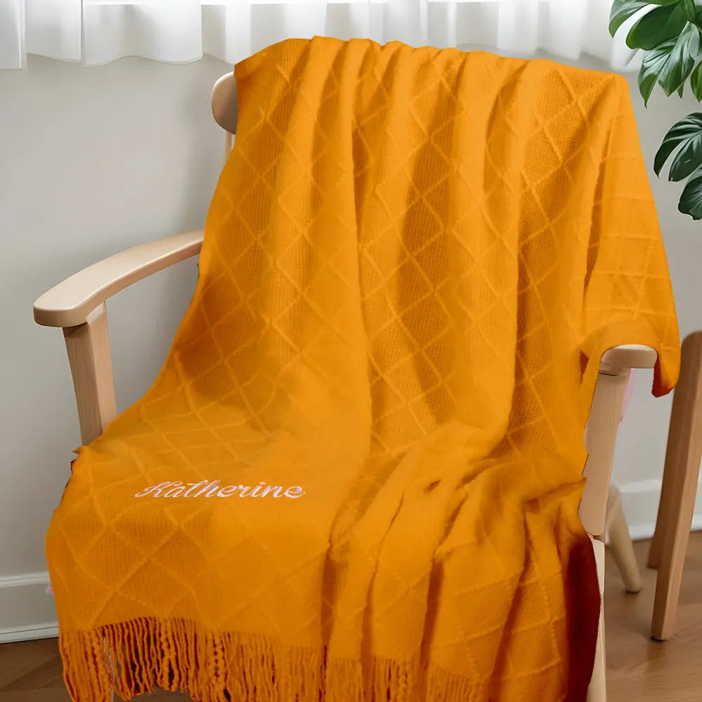 The blanket spread in a nursery setting to illustrate its cosy feel for children’s rooms.