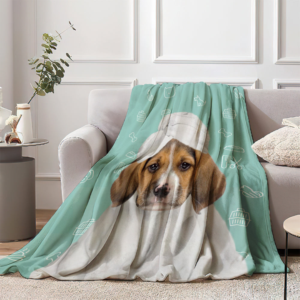 Personalised pet blanket laid on a sofa featuring a custom photo of a dog in a bathrobe — ultra-soft flannel photo pet blanket, perfect personalised photo gift