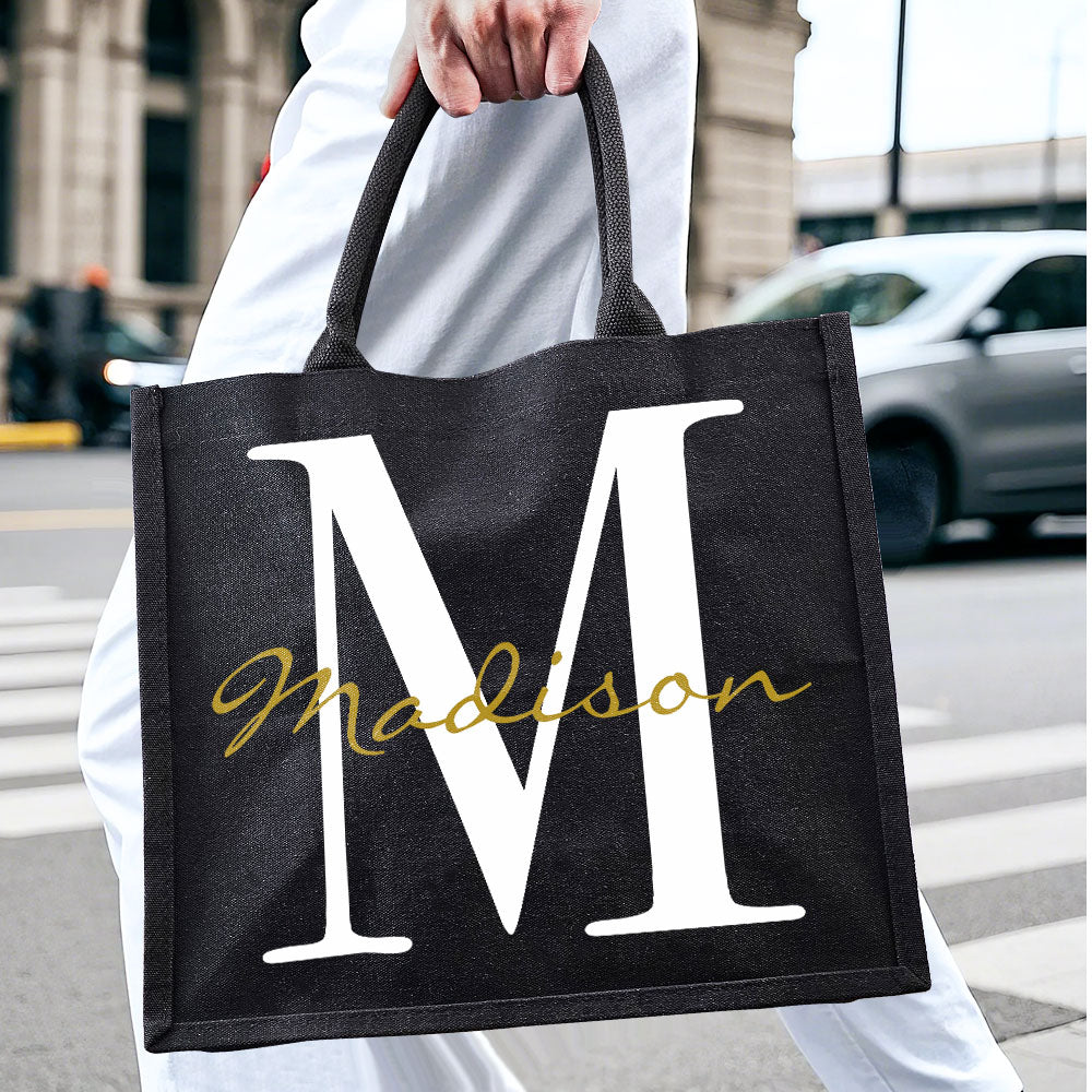 Visual of the customisation and ordering process for the personalised black canvas tote — upload assets, production, quality inspection and dispatch