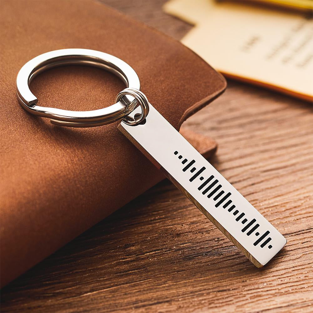 Double-sided engraved music code keychain showing code on one side and bespoke message on the reverse – personalised Spotify song keyring