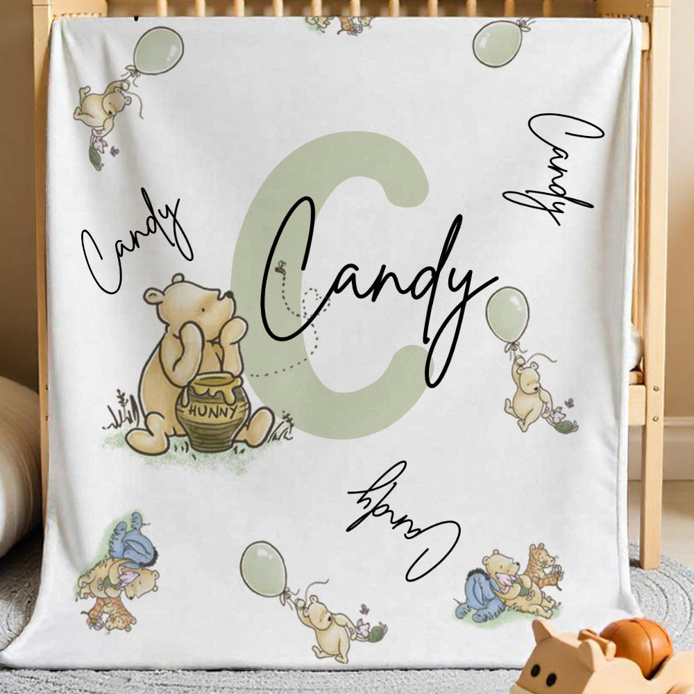 Angle shot of Winnie the Pooh blanket highlighting soft texture and print.