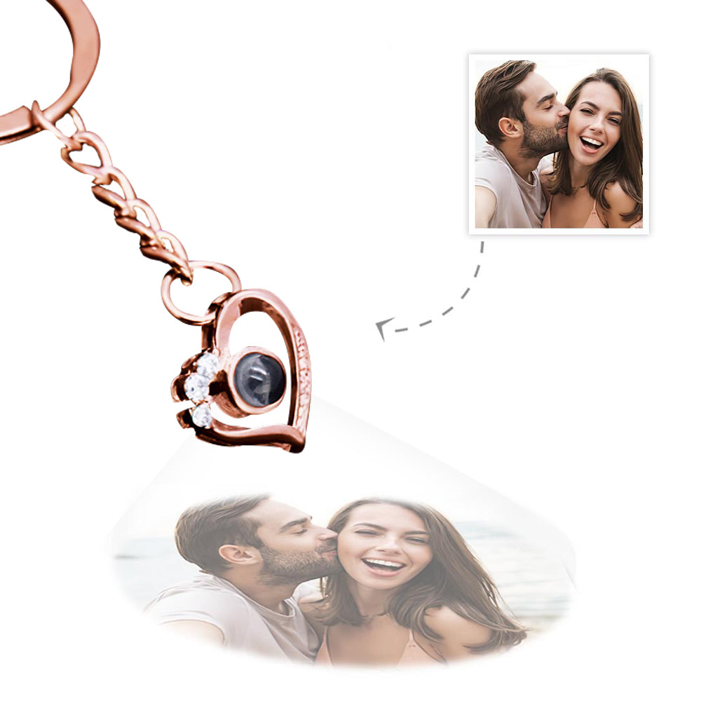 Personalised heart projection keyring in polished S925 sterling silver, heart-shaped micro-engraved pendant on a sturdy metal key ring