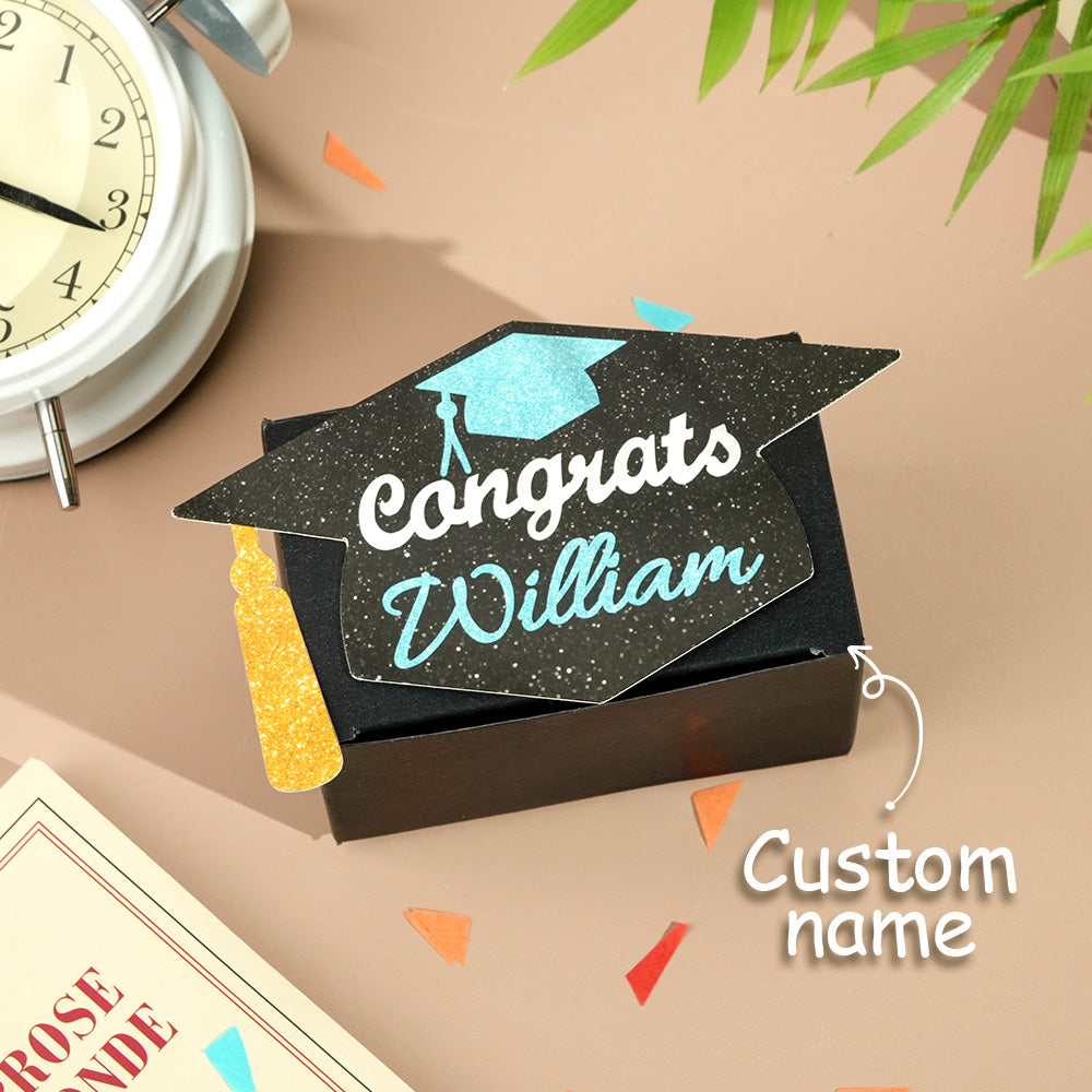 Close-up of 30 clear OPP pockets in a graduation cash gift box holding banknotes and cards