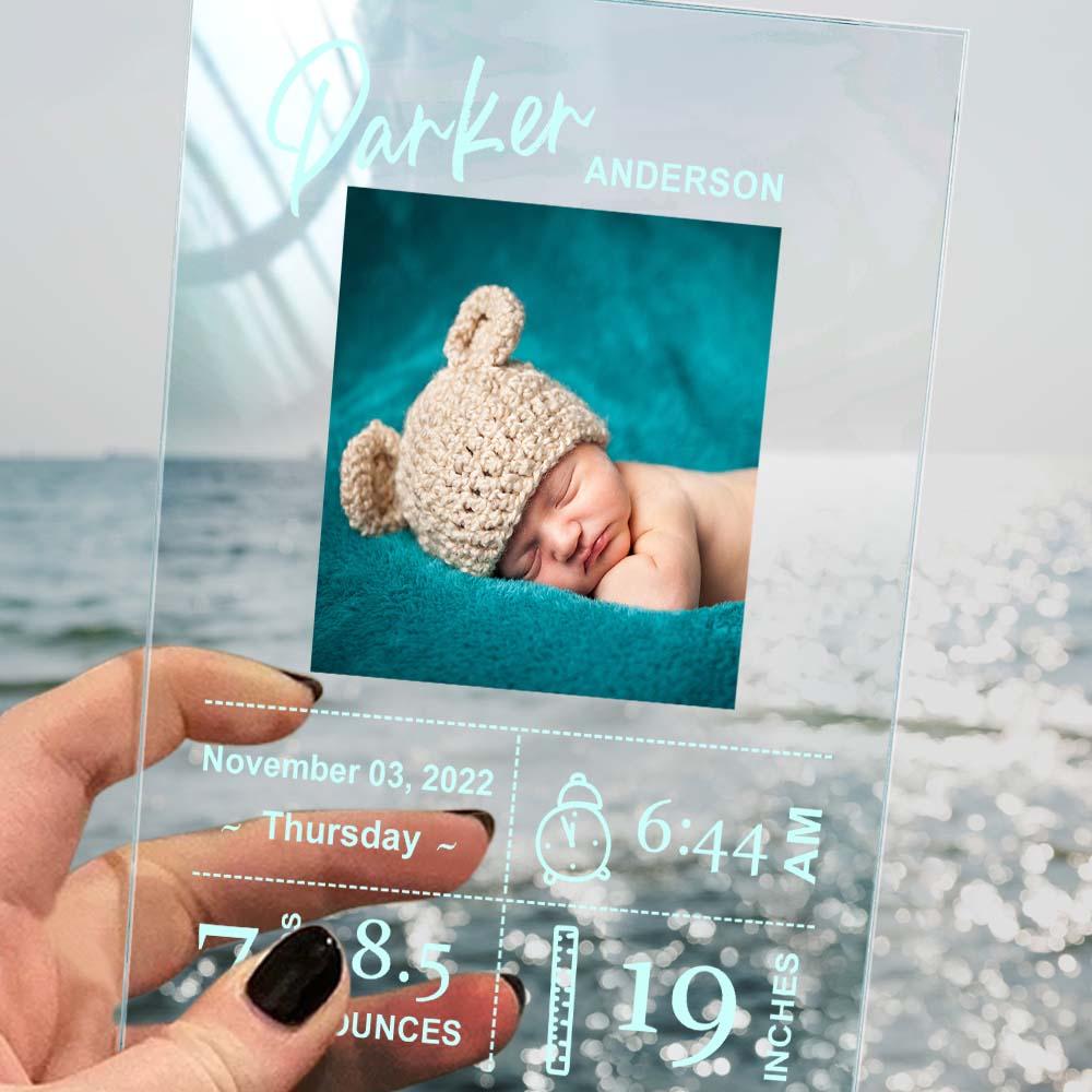 Detail of engraved name and birth details on personalised baby plaque - precise engraving for a treasured birth keepsake