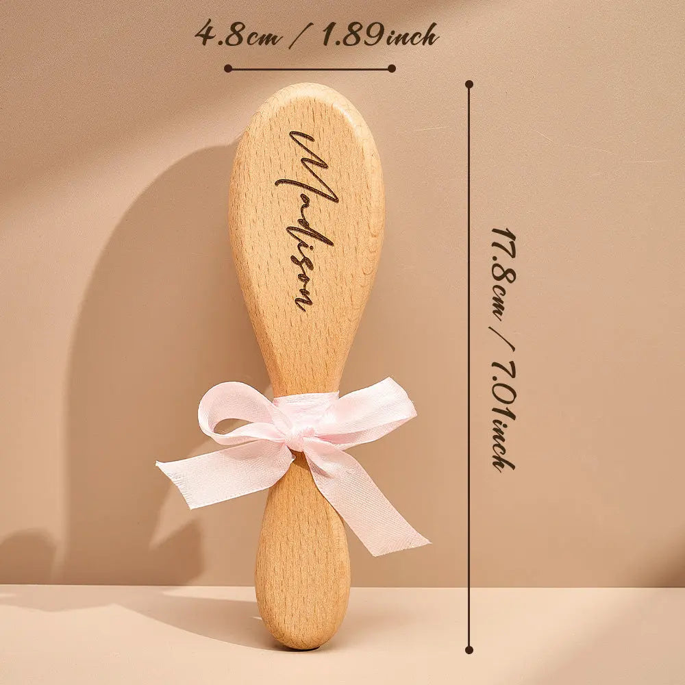 Gift-ready presentation of personalised baby hairbrush and wooden comb in a tasteful layout — the ideal baby shower gift personalised for new parents