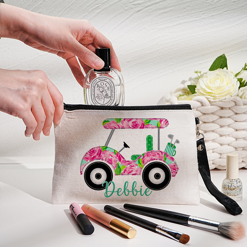 Personalised golf cart makeup bag open showing interior space for brushes and cosmetics — travel-friendly toiletry pouch