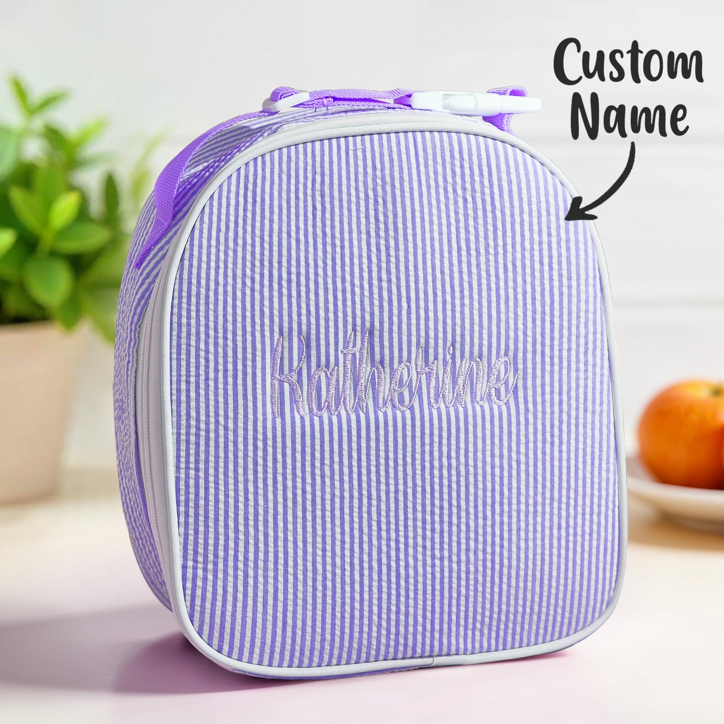 Interior view of personalised seersucker lunch bag showing roomy compartment that fits standard lunch containers and snacks