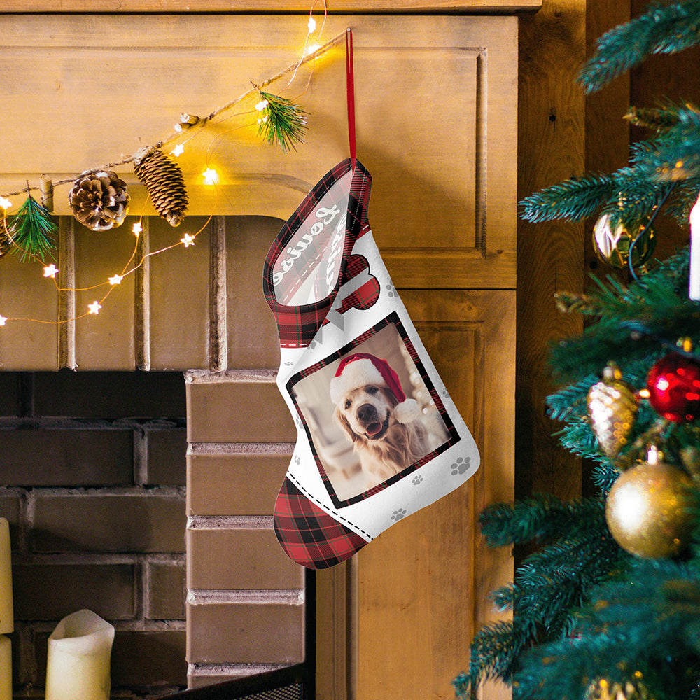 Velvet personalised stocking filled with pet treats and toys, personalised with a pet photo and name for a festive gift idea
