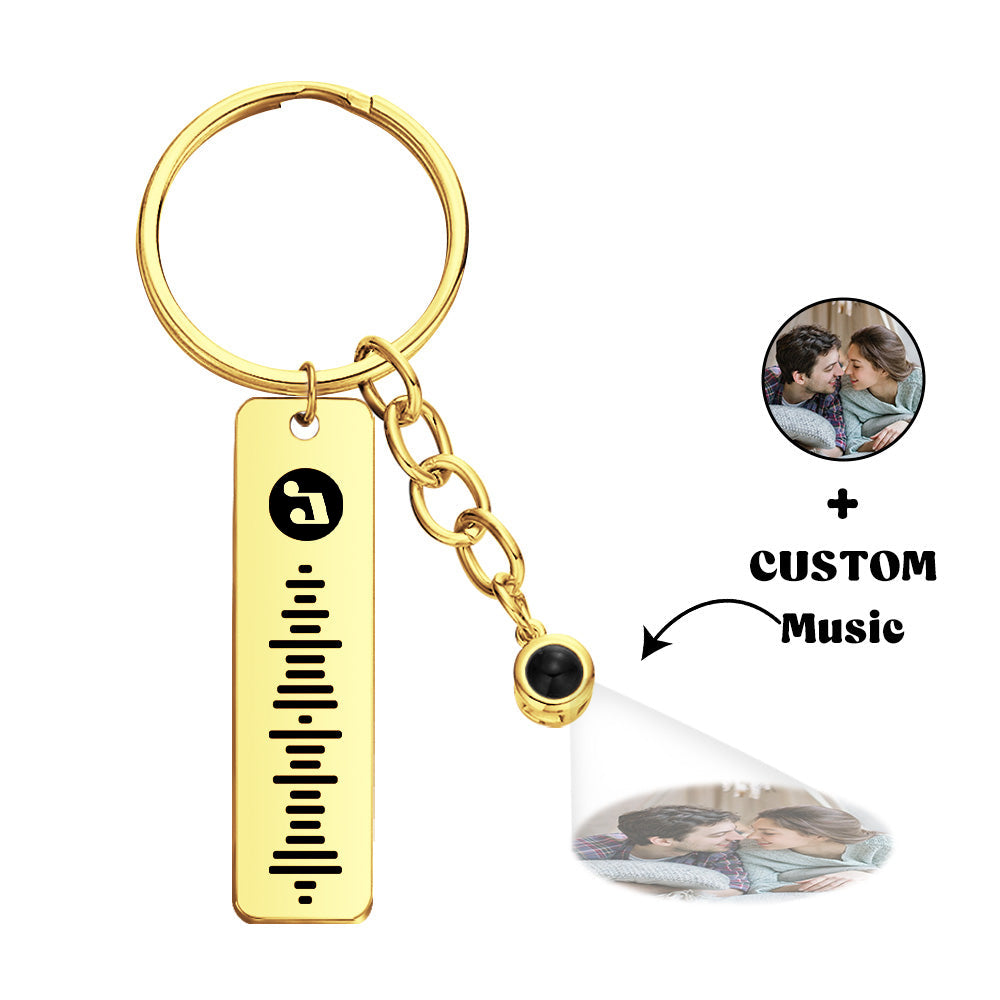Assorted personalised song keyrings showing different artist names and photos – unique custom metal keychain gifts