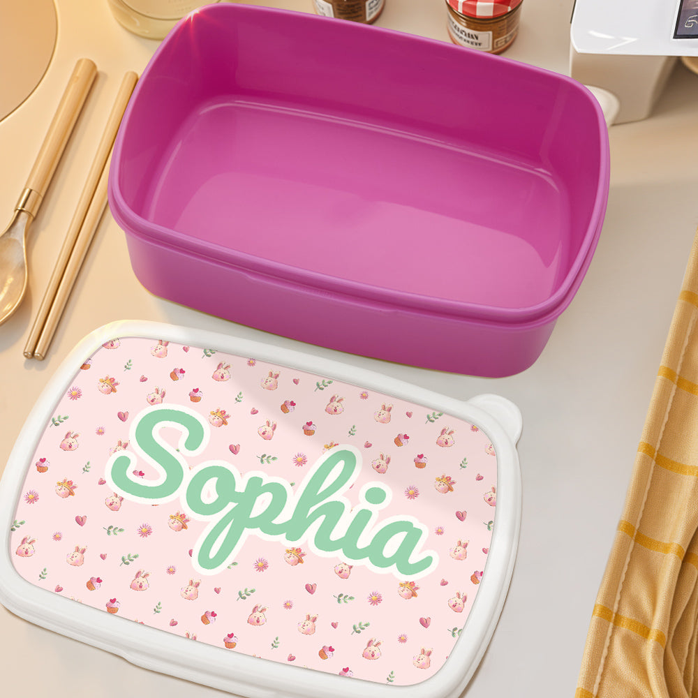 Close-up of personalised name print and charming rabbit illustration on a kids' lunch box to prevent lost items