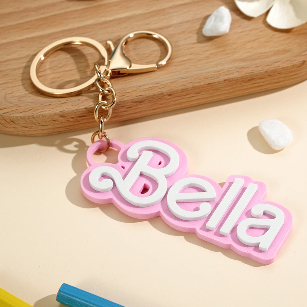 Personalised kids' bag charm attached to a lunch bag with secure ring clip engraved gifts for sons and daughters