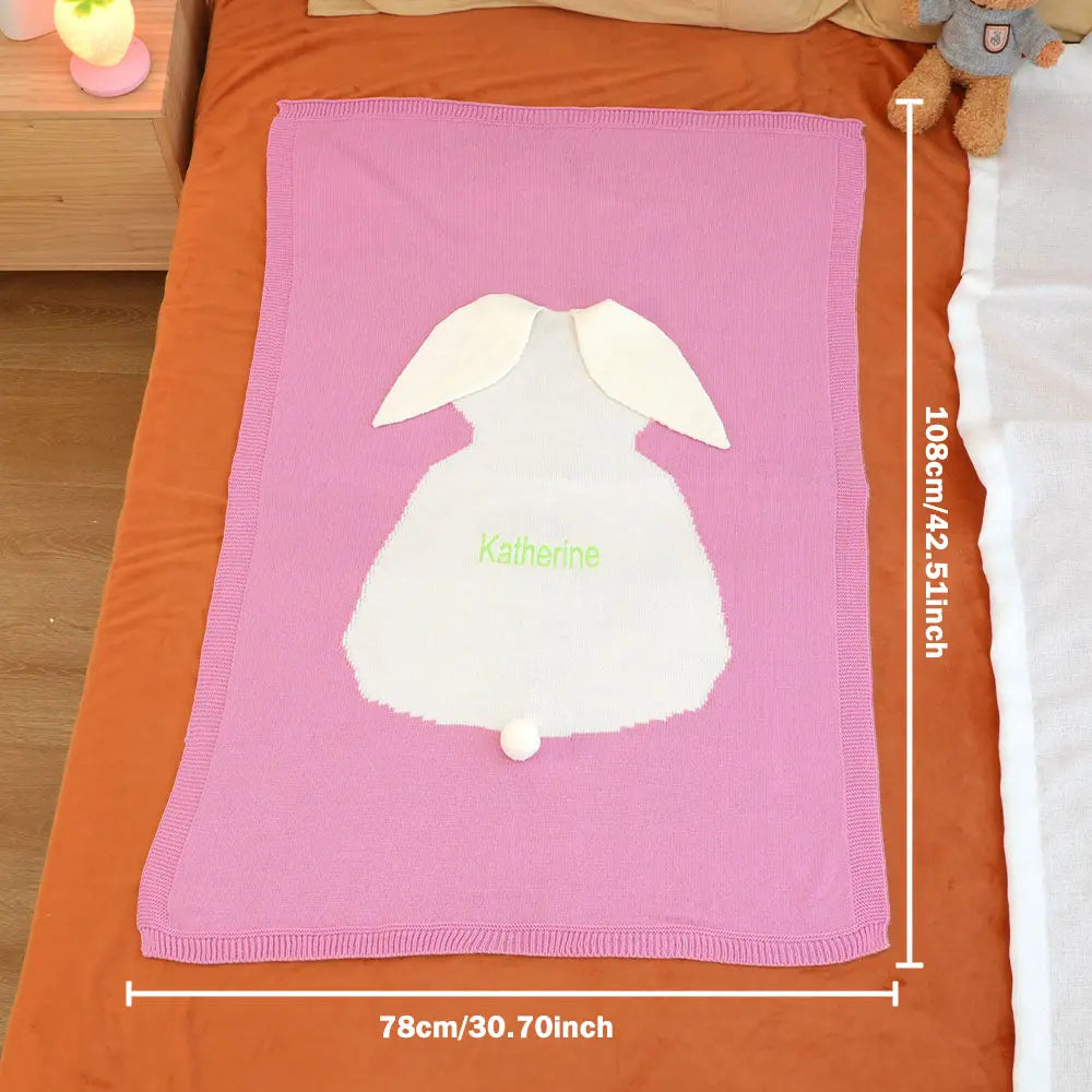 Lifestyle view of the nursery-ready personalised bunny blanket with embroidered name.