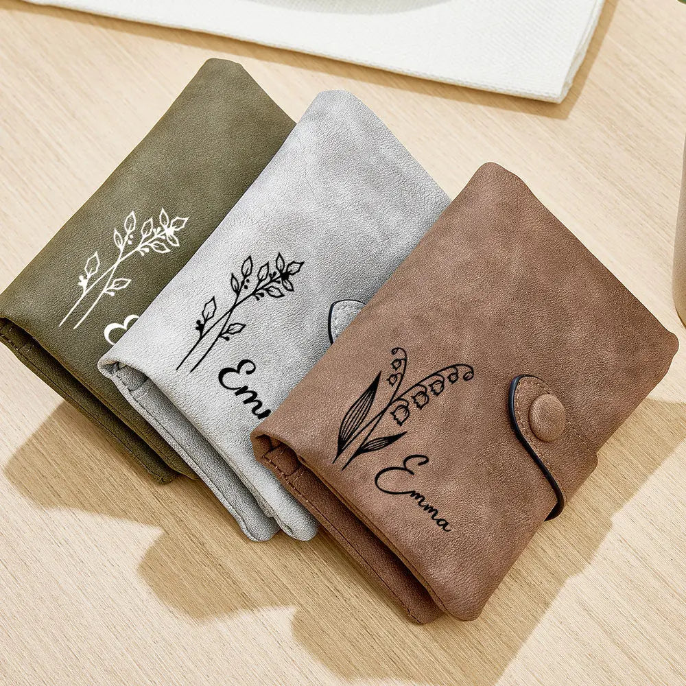 Open view of personalised PU leather card holder with multiple card slots and folded notes, personalised with name and birth flower — practical personalised gift