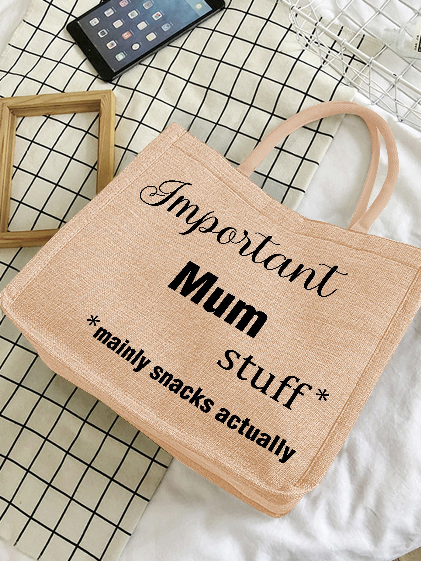 Close-up of hand-engraved lettering on a personalised jute tote — detailed engraved jute bag finish