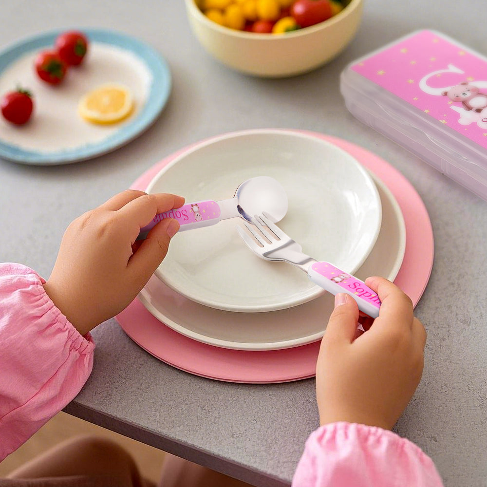 Close-up of personalised cartoon animal fork, spoon and knife showing durable stainless steel blades and colourful BPA-free PP handles