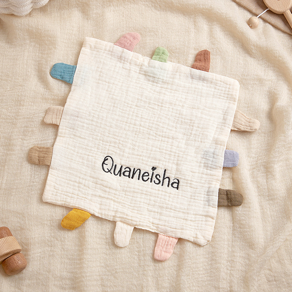 Folded personalised cotton lovey showing embroidered name detail – ideal baby security blanket and newborn gift