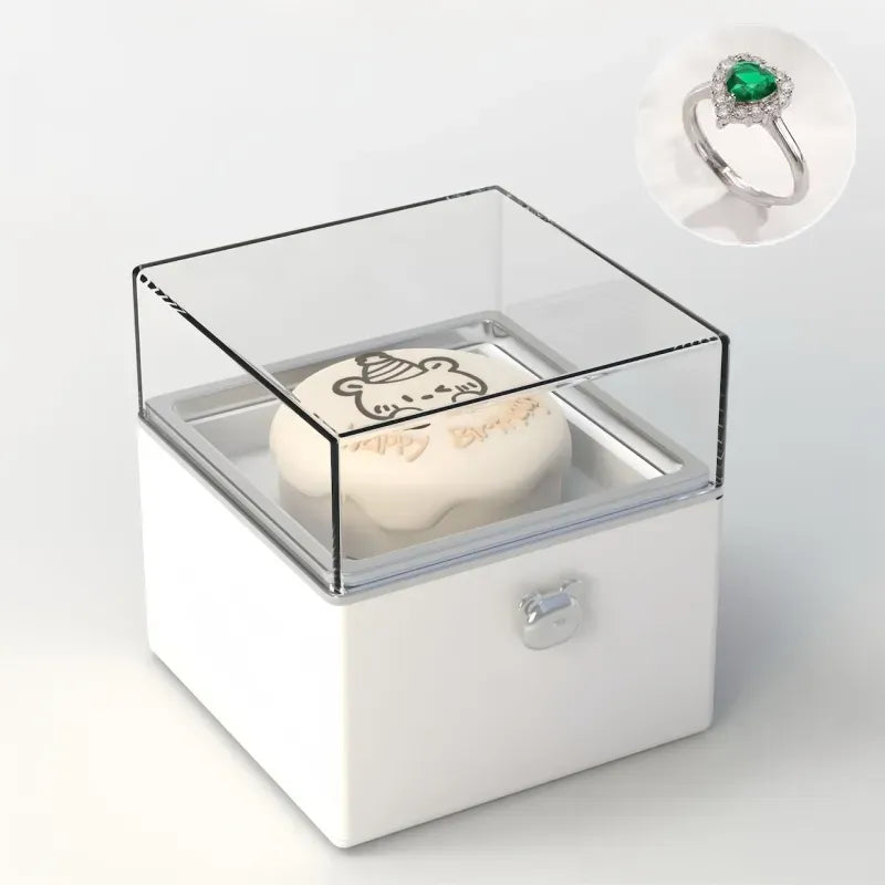 Romantic candlelit reveal of the Bear Cake Ring Box with a flicker effect as the ring rises — cinematic engagement moment