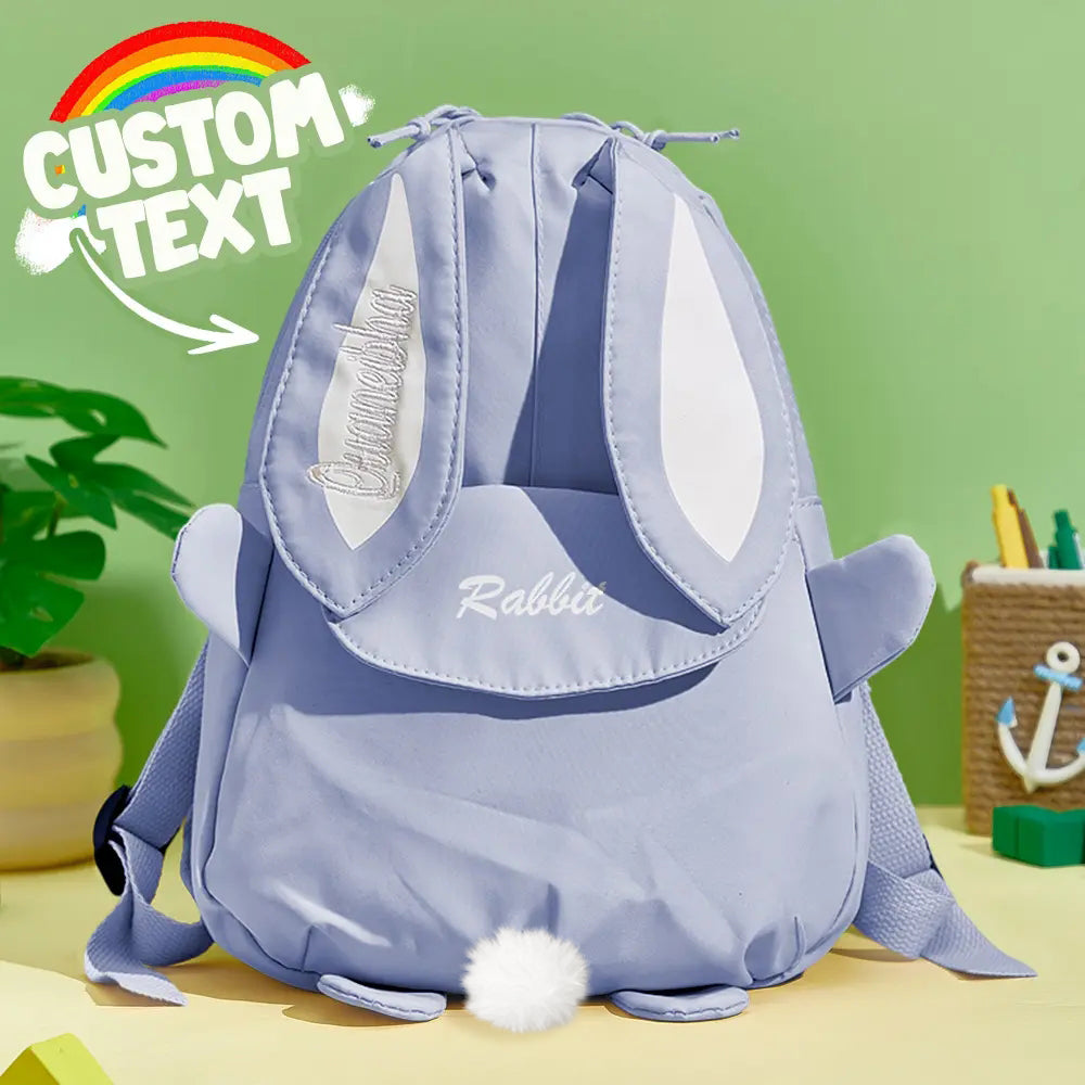 Rear view of personalised mini rabbit backpack displaying adjustable padded straps and reinforced carry handle, perfect for nursery and kindergarten use