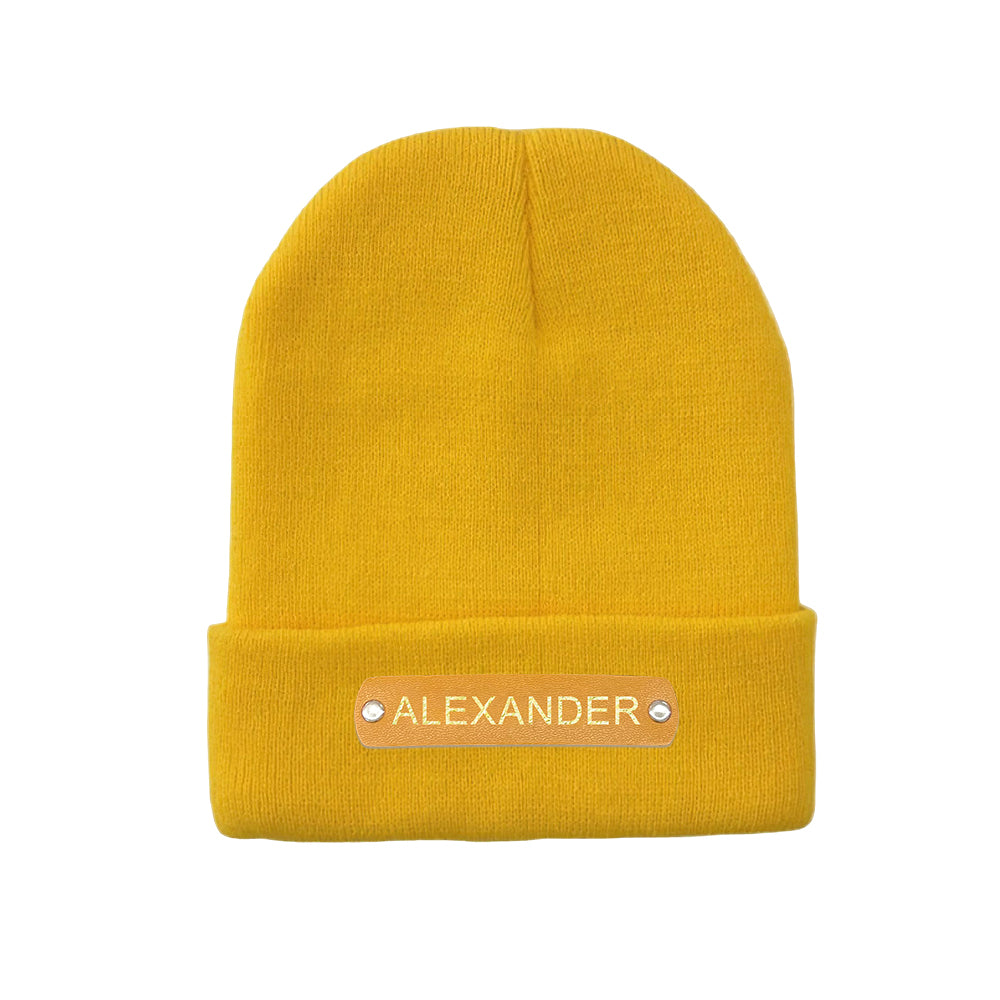 Side profile of personalised beanie showing comfortable one size fits most fit and leather name patch with custom text