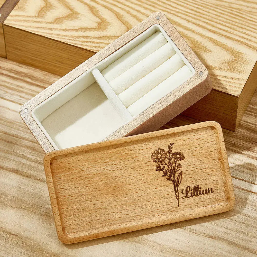 Compact 13x6.5x4cm personalised jewellery box displayed with rings and earrings — space-saving wooden jewellery organiser for travel