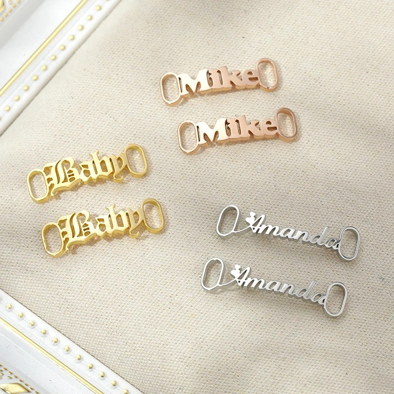 Three colour finishes of personalised metal shoelace charms—silver gold and rose gold—stainless steel custom shoe buckles