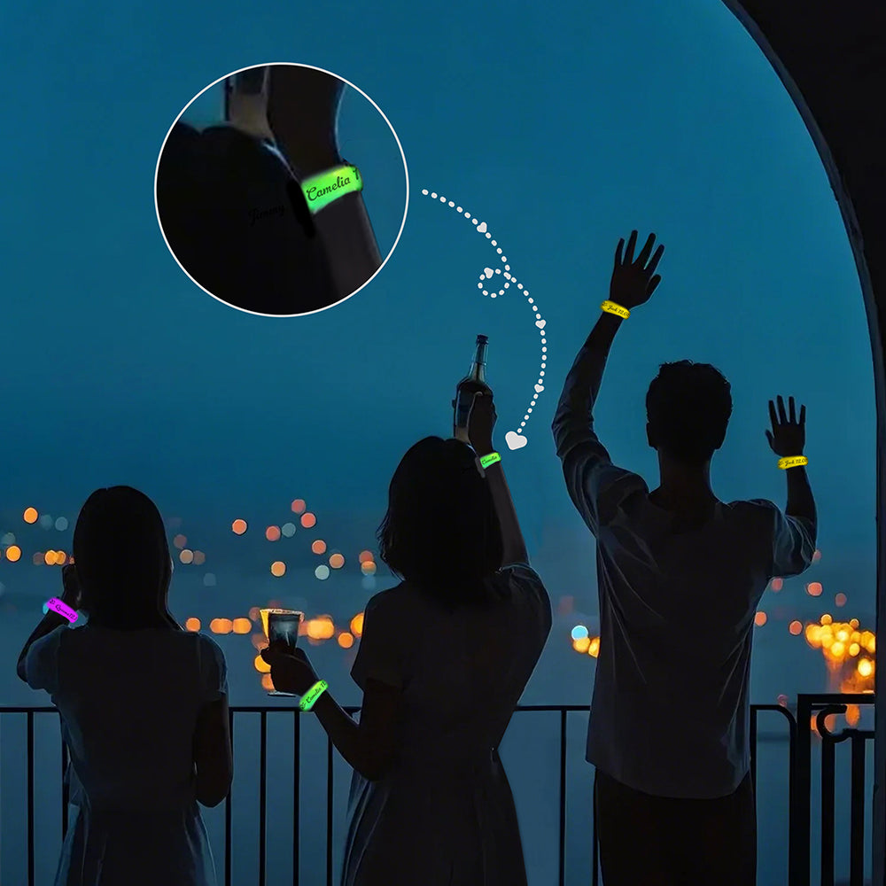 Personalised LED glow bracelet glowing on a wrist at a night event creating a vibrant atmosphere — great for concerts, weddings and birthday celebrations