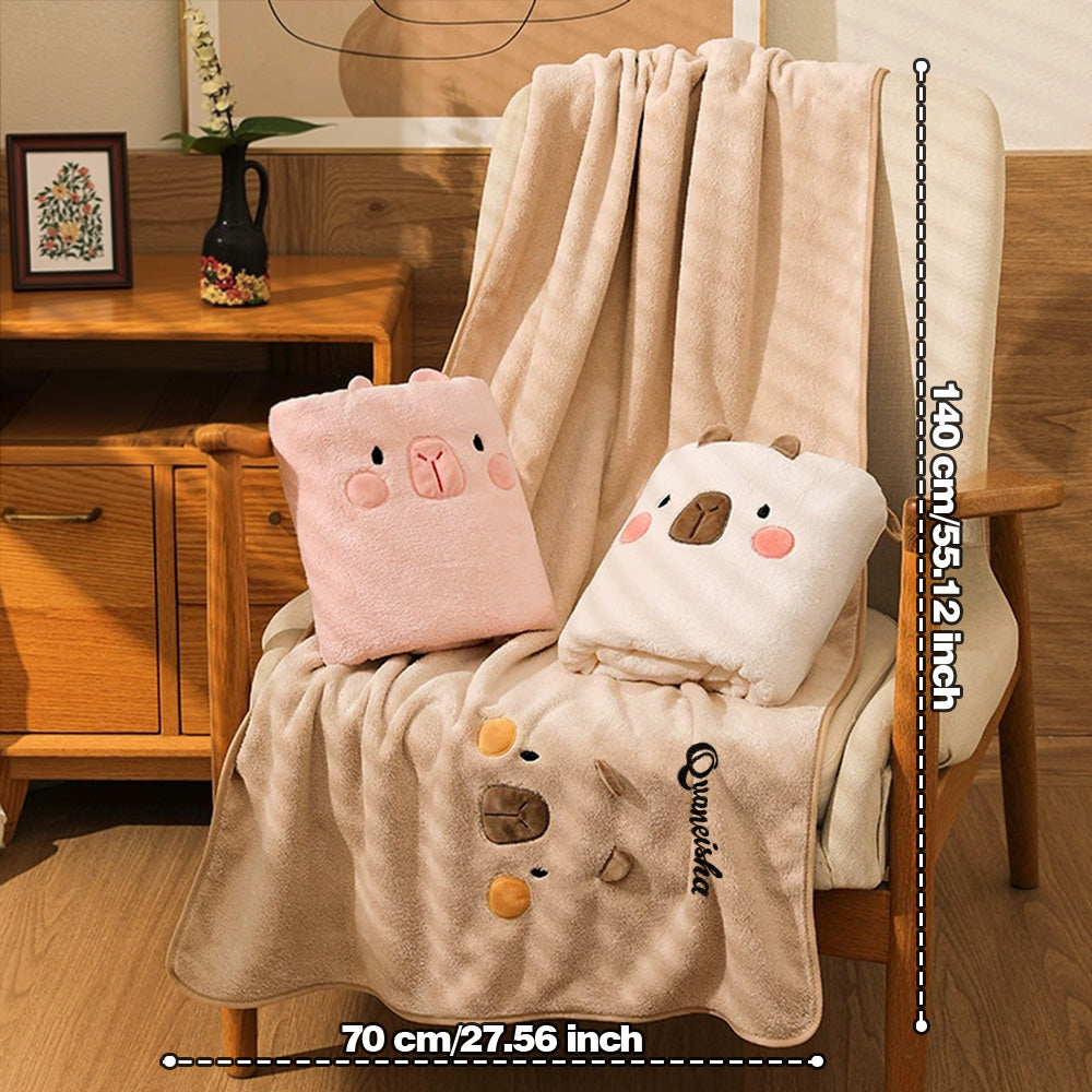 Care label and close-up of fabric on personalised coral fleece towel with washing guidance to preserve embroidery quality