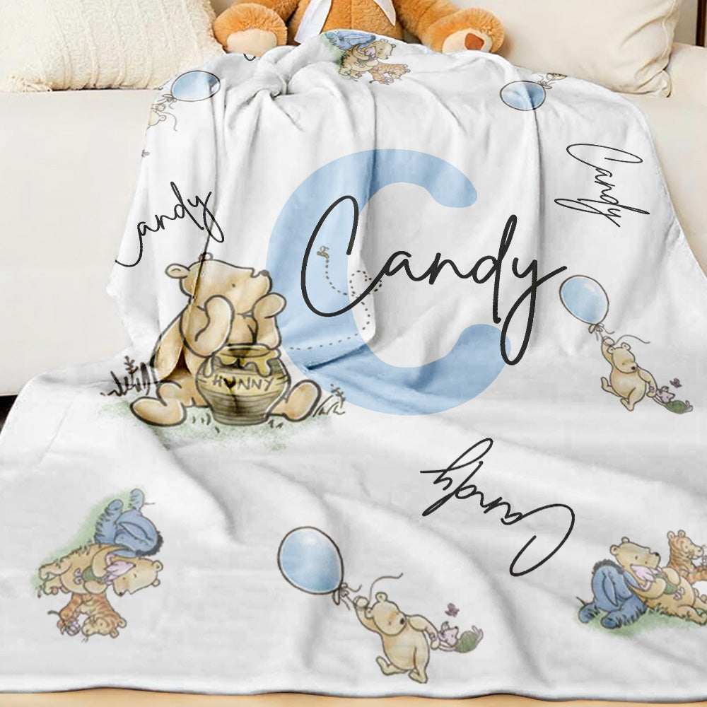 Nursery decor with Winnie the Pooh personalised blanket as a cosy decor accessory.