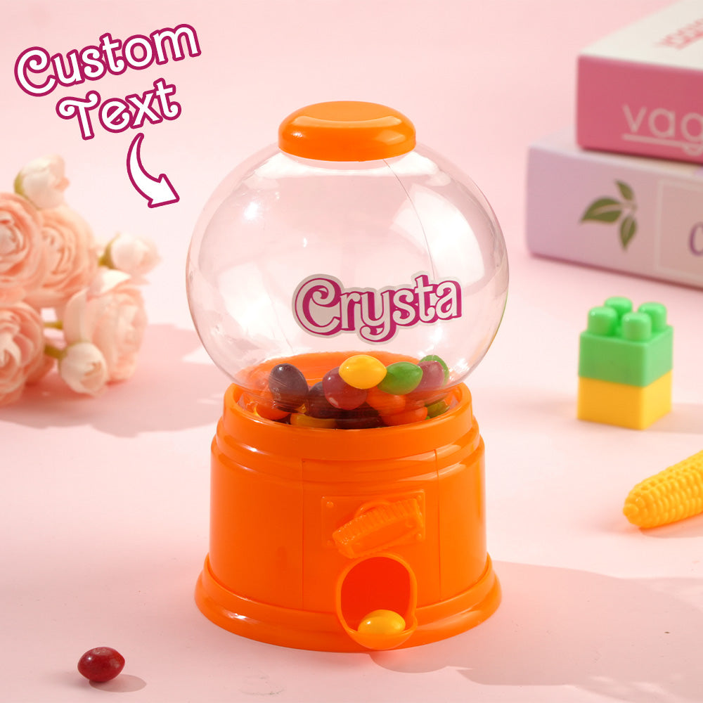 Scale comparison of personalised mini gashapon candy dispenser next to everyday items to show compact 10 x 14.5 cm size - ideal stocking filler
