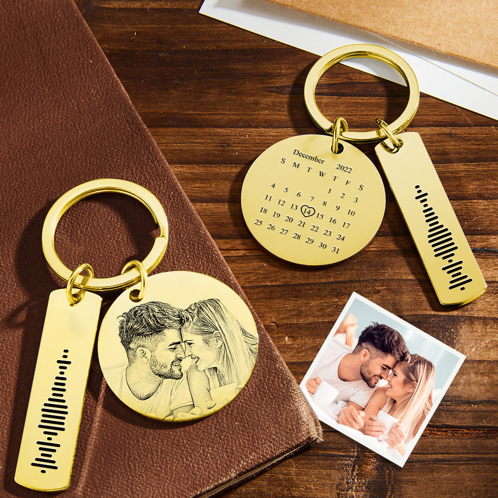 Custom calendar and photo keyring set with personalised engraving and scannable music code — stainless steel keepsake ideal as a gift