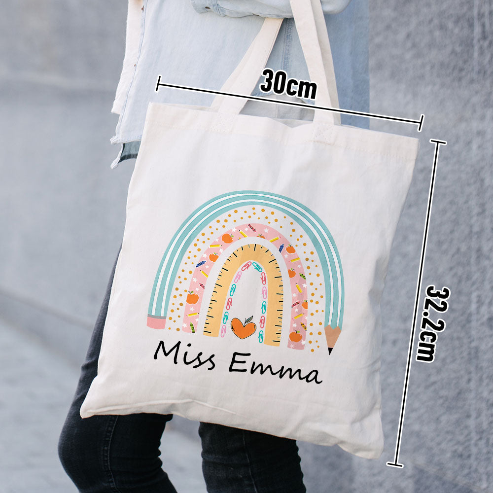 Close-up of boho rainbow design and personalised name on canvas tote, showing neutral tones and quality print and stitching