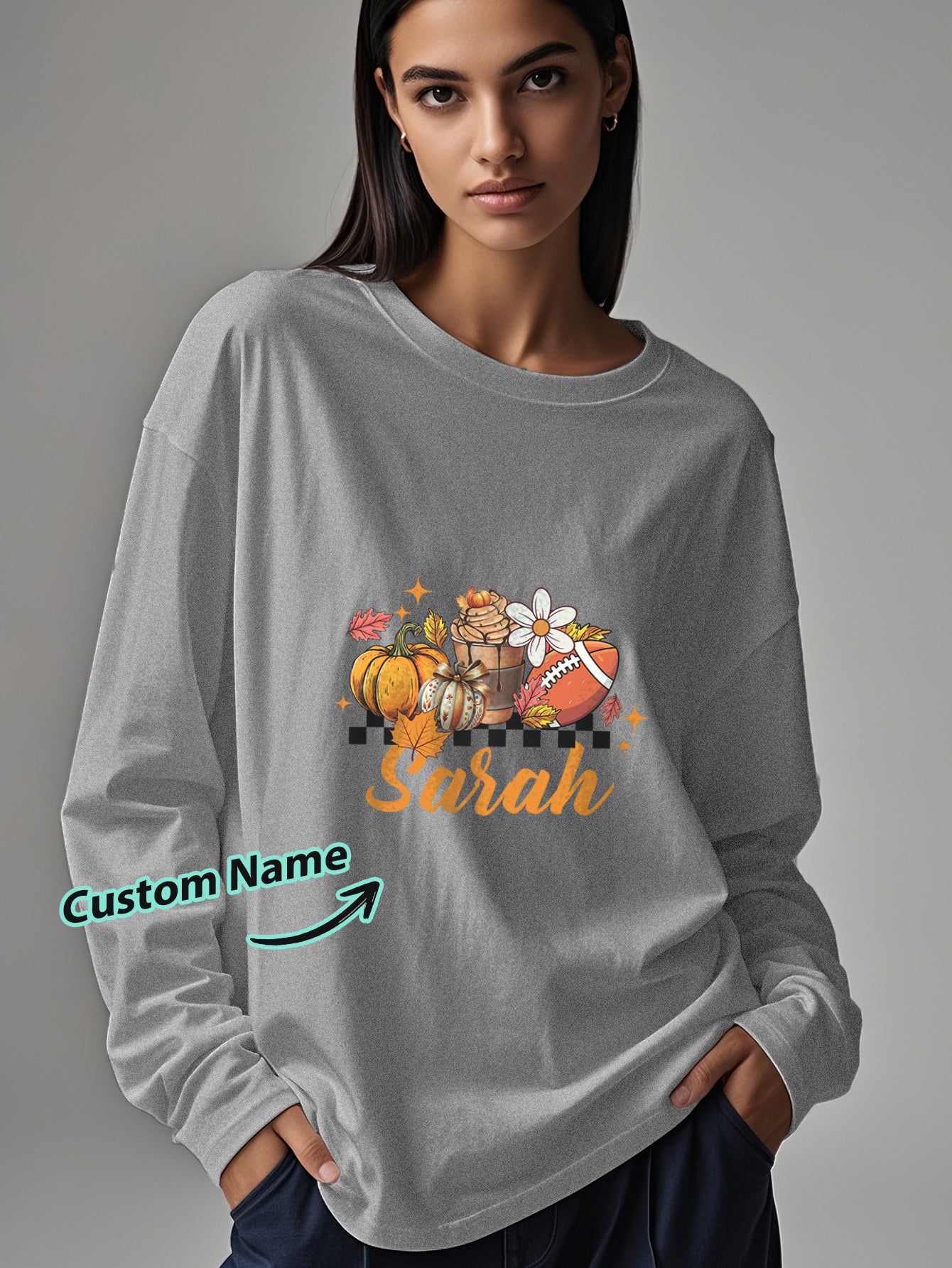 Personalised Halloween long-sleeve T-shirt on hanger illustrating ready-to-wear silhouette and polyester construction