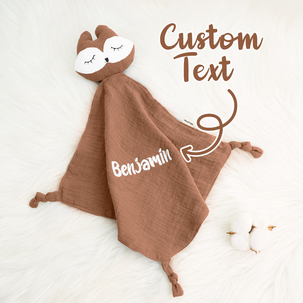 Stack of personalised comfort towels in assorted colours with embroidered names — ideal set for baby shower or new-parent gifts