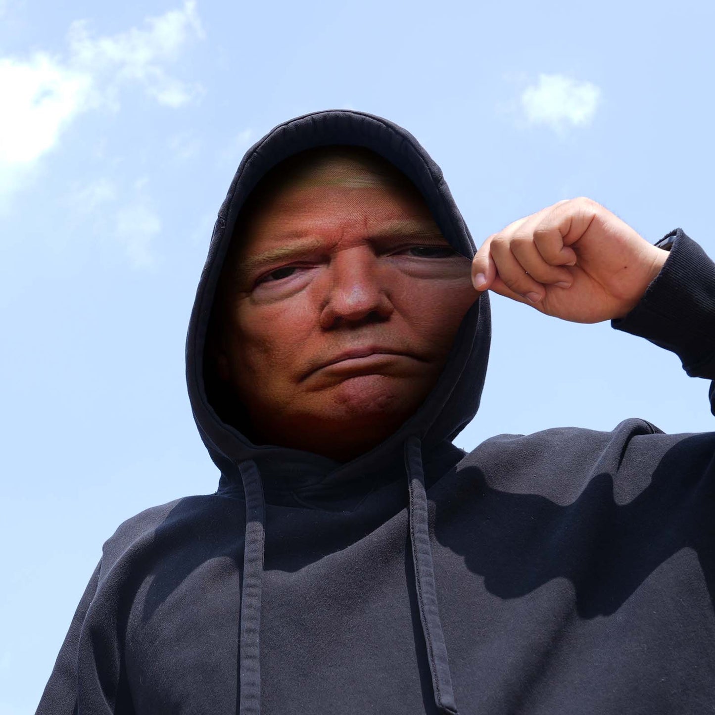 Model wearing personalised Trump 3D spoof mask at a party, realistic and funny cosplay accessory ideal as a personalised gift