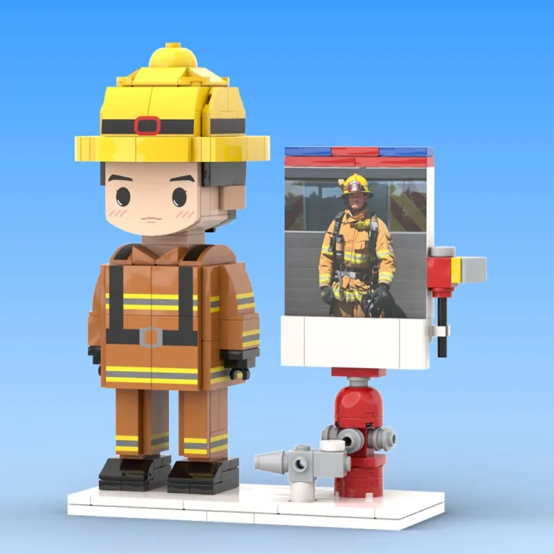 Scale comparison of custom brick figure beside a hand to show approximate stature (13.4 × 6.4 × 14.9 cm) — personalised firefighter figure, photo custom minifigure‑style gift