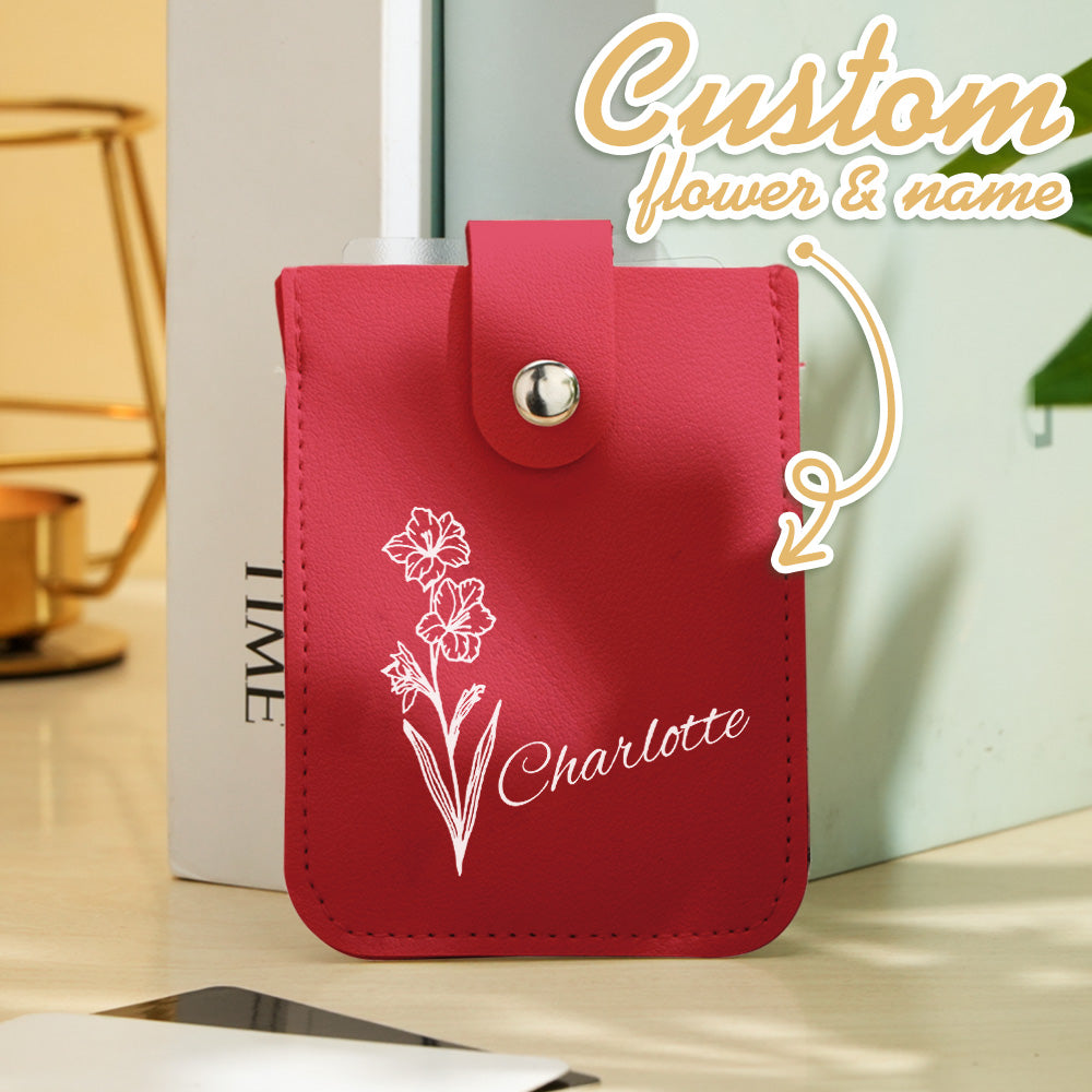 Collection of personalised birth flower mini card wallets displaying different floral motifs and custom name options