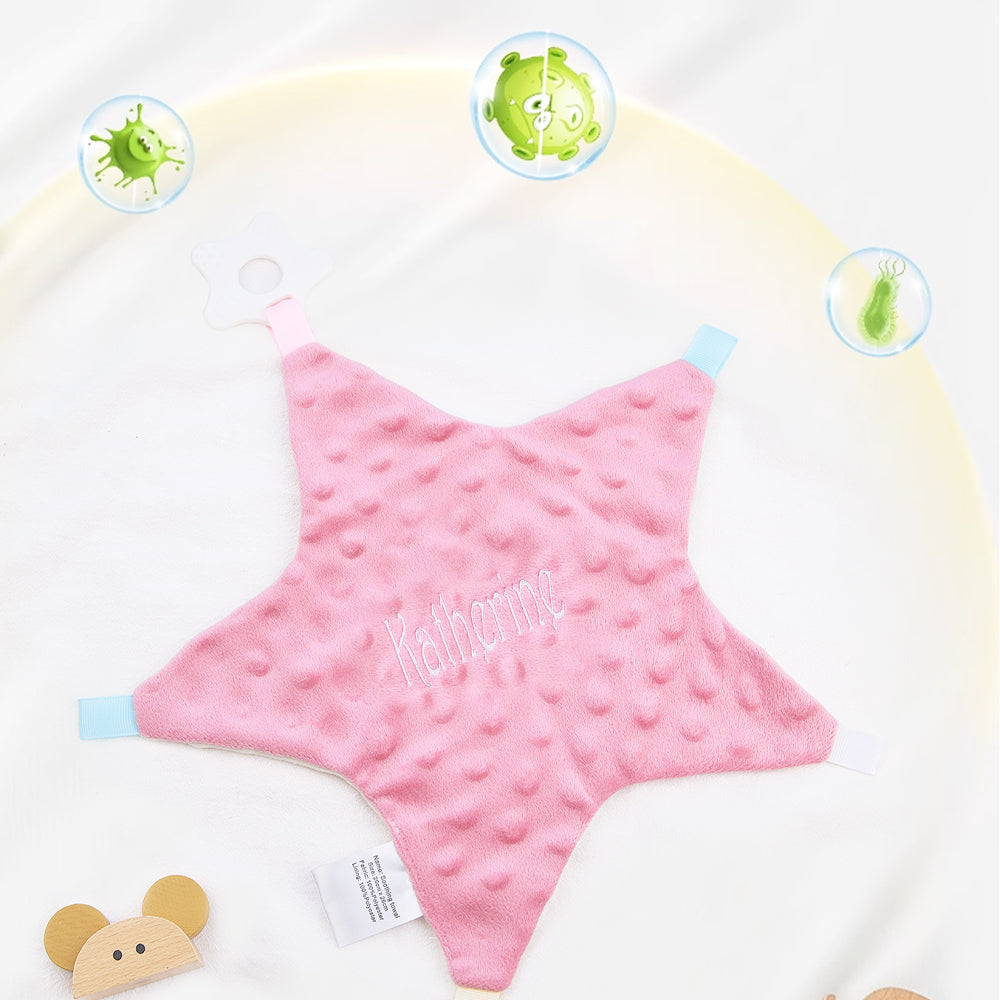 Detail of soft cotton texture on a personalised star comforter, breathable fabric gentle on delicate baby skin