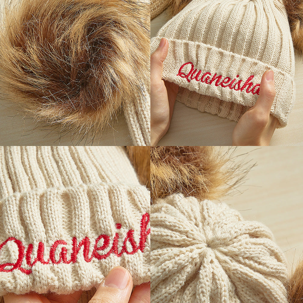 Parent and child wearing personalised embroidered beanie hats outdoors — matching knitted Orlon set for cosy winter walks and family gifting