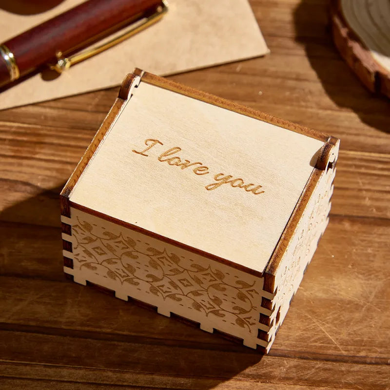 Compact personalised music box with USB charging cable and built-in rechargeable battery, up to one hour continuous playback